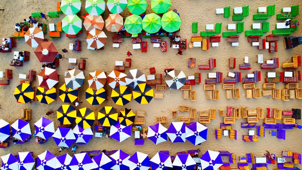 Accra: Vibrant aerial view of beach umbrellas and seating in Accra, Ghana.