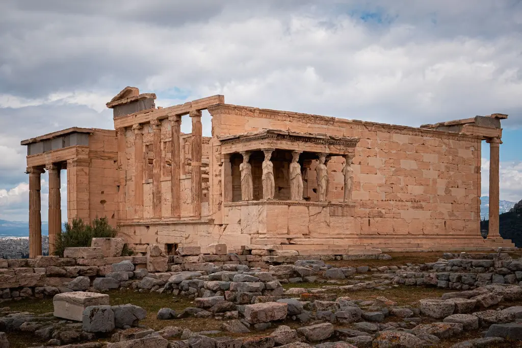 Athens: View of the ancient Erechtheion Temple with its iconic Caryatids, located at the Acropolis in Athens, Greece.