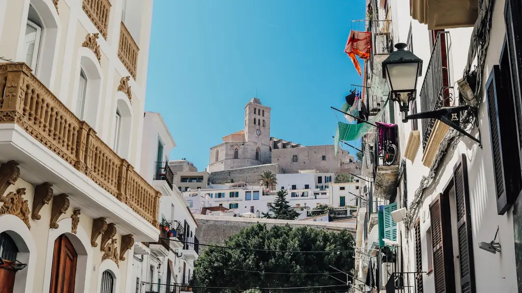 Ibiza: Ibiza Old Town a street with buildings and a lamp post