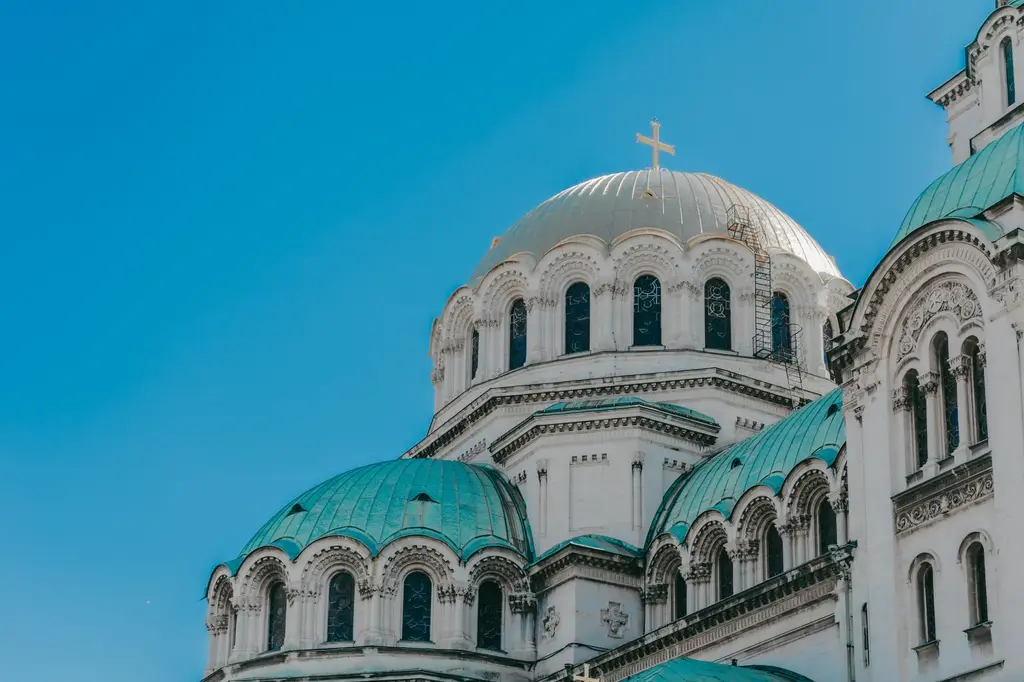 Sofia: The iconic domes of Alexander Nevsky Cathedral against a clear blue sky in Sofia, Bulgaria.