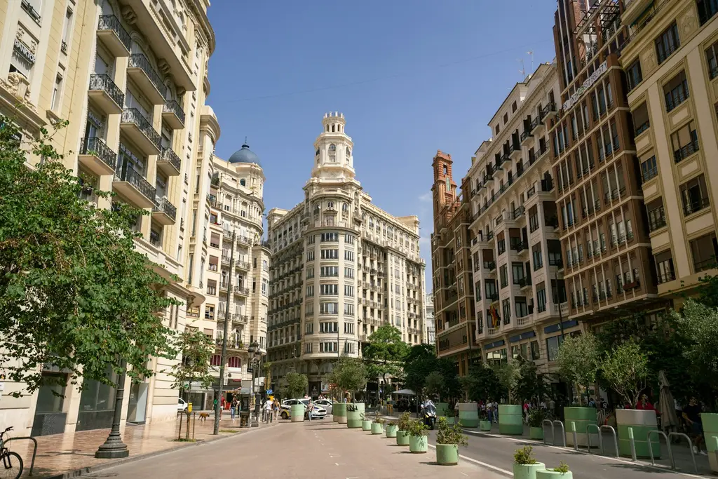 Valencia: Plaza de Ayuntamiento in Valencia, Spain. If you used the photograph we would love if you could mention https://en.northleg.com/ a street with buildings on eith